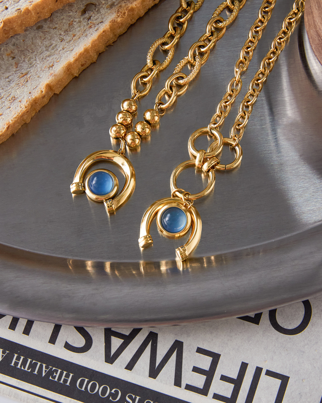 Arco Azzurro Bracelet two gold blue stone bracelets worn together