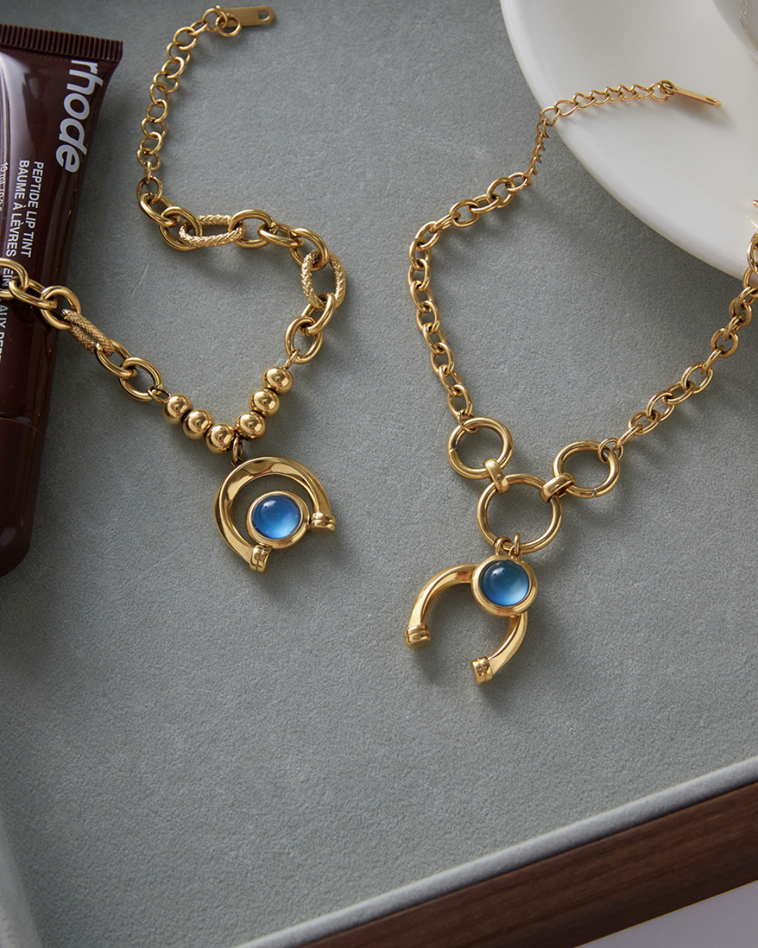 Arco Azzurro Bracelet full product view of two bracelet styles with blue stone charms