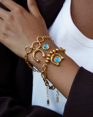 Arco Azzurro Bracelet two gold blue stone bracelets worn together