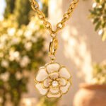 Avelora Necklace displayed in a luxury product setup with a refined background, highlighting its elegant dual-tone design