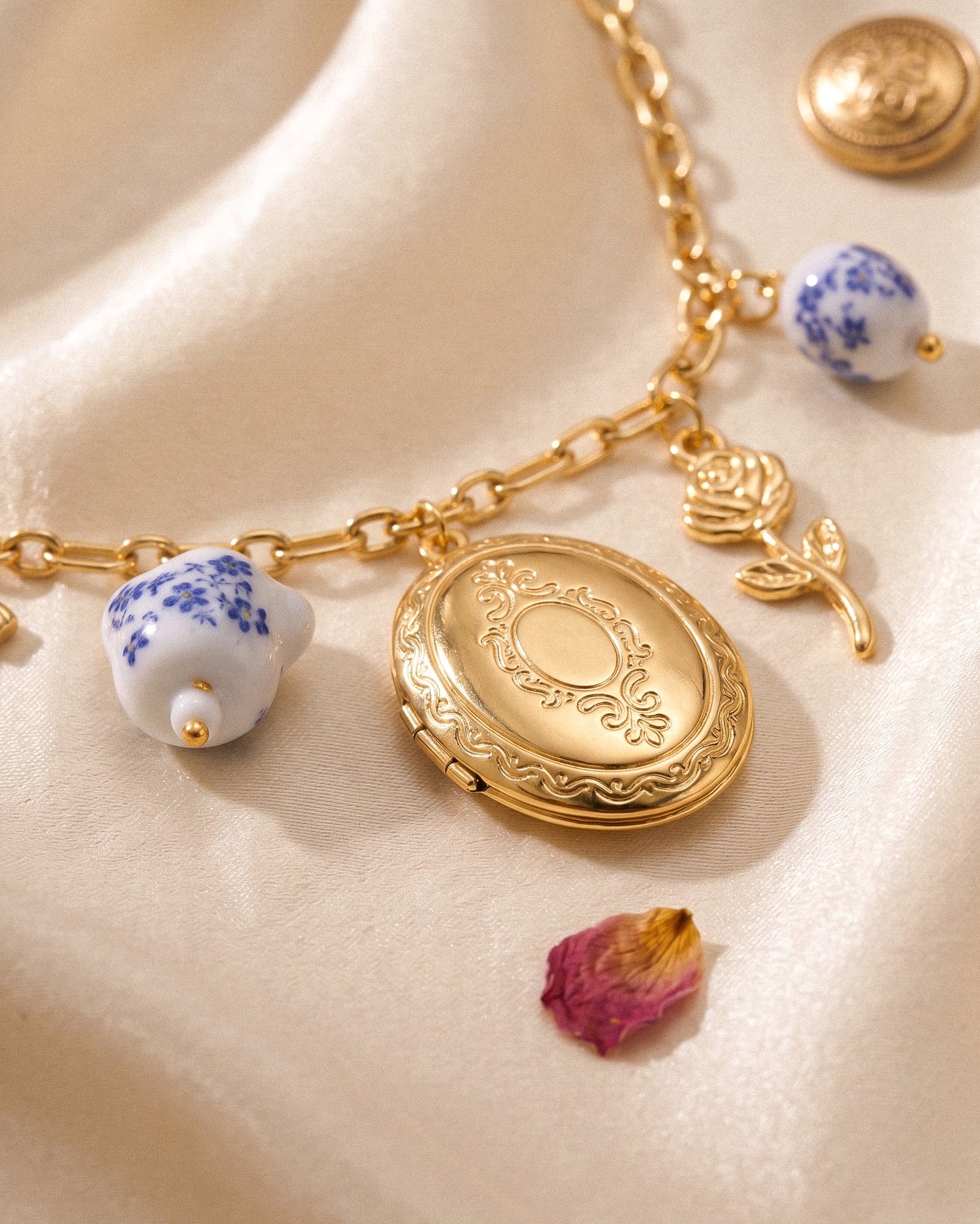 Rosalia Charmante gold-plated charm necklace with locket from BrillaViva Charm Necklaces collection
