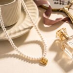 Cuore di Perla Necklace styled product image with pearl-inspired beads and heart pendant