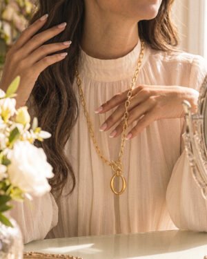 Valdora Necklace unfolded on model in a full outfit view