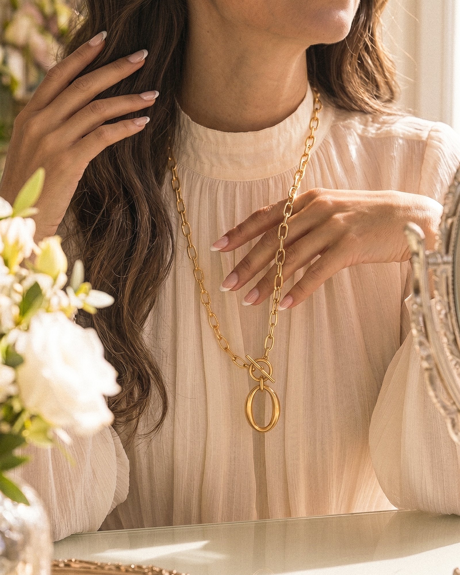 Valdora Necklace unfolded on model in a full outfit view