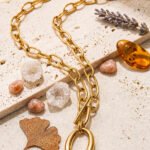 Valdora Necklace styled on a marble background in an elegant product composition