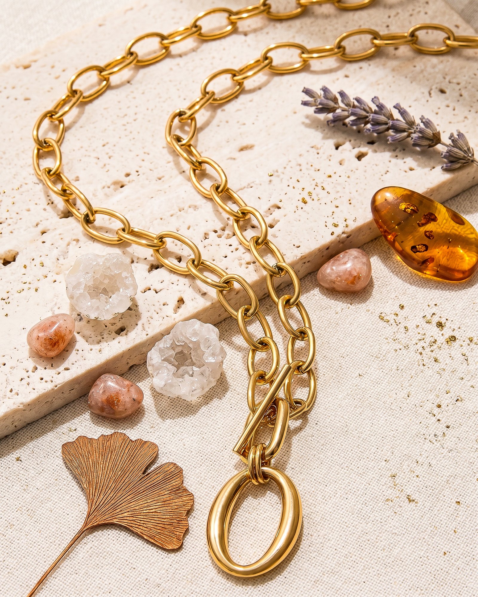 Valdora Necklace styled on a marble background in an elegant product composition