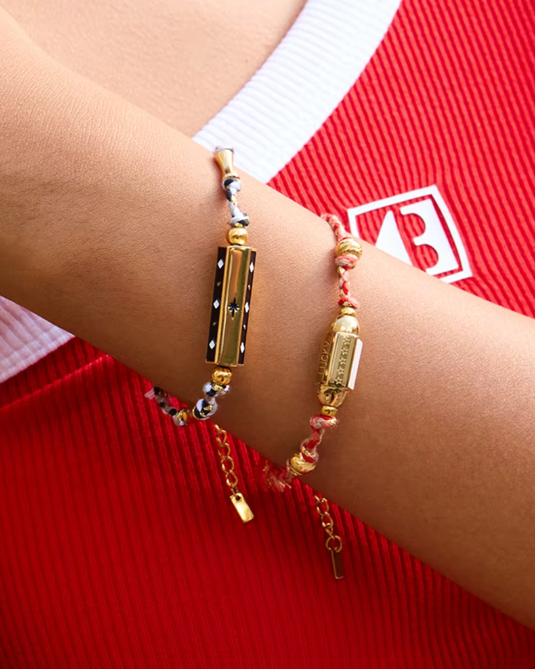 Close up of Amuleto Bracelet golden engraved charm