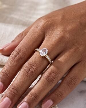 Cristallo Ovale Ring worn close-up on finger with sparkling stones