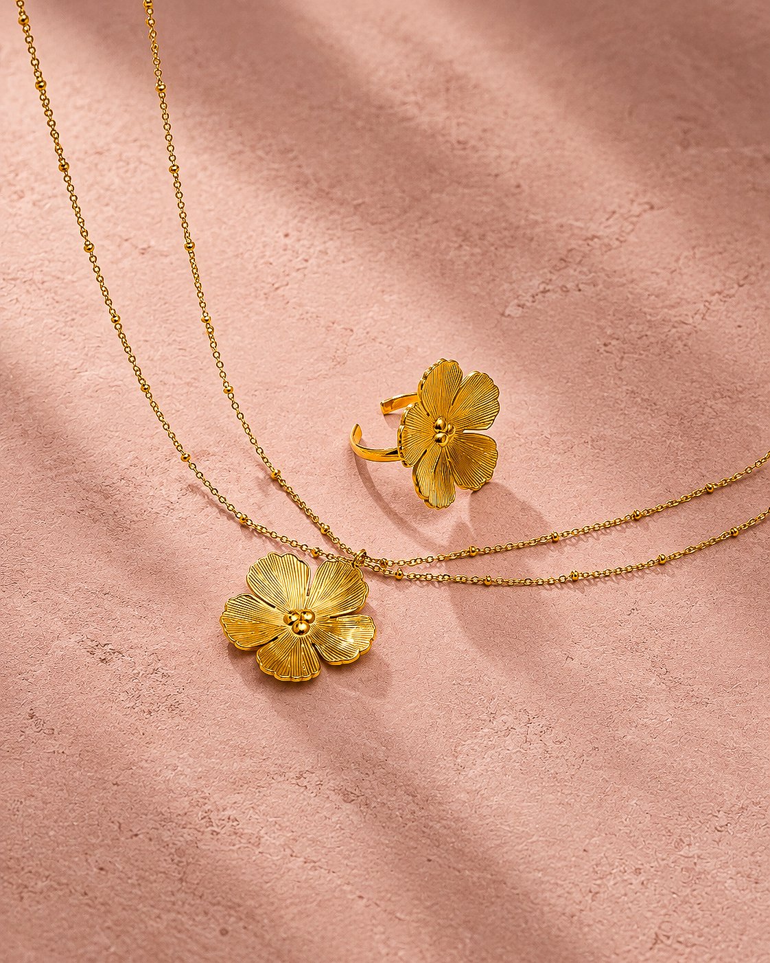 Fiore Aurelia Necklace product image with floral pendant and double chain design