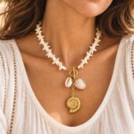 Marina Alba Necklace styled on model with a summer outfit and feminine beach-inspired look