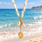 Marina Alba Necklace displayed on background showing full front view with shell beads and gold charms