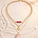 Seravelle Necklace displayed on a clean background showing its complete three-layer design