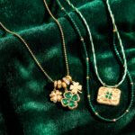 Veralia Duo Necklace displayed on background showing both coordinated green and gold necklaces