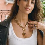 Ambralia Necklace main product image with smoky heart-shaped beads and gold details
