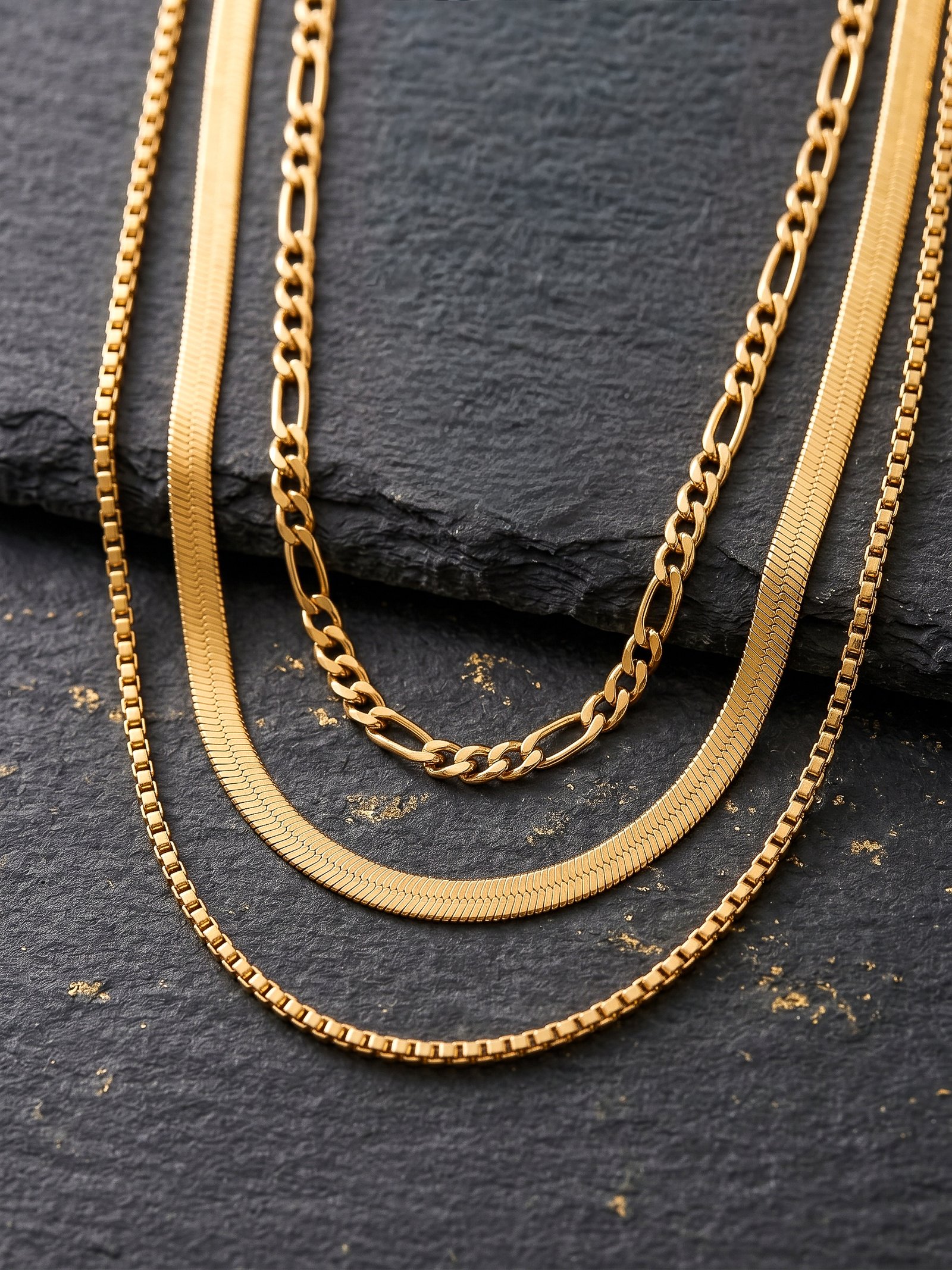 Close-up of Elvara Necklace on background showing layered chain details
