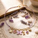 Flat lay of Lunella Charm Necklace with lilac braided cord and gold charm details