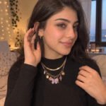 Side-angle model photo of Lunella Charm Necklace with lilac cord and gold chain section