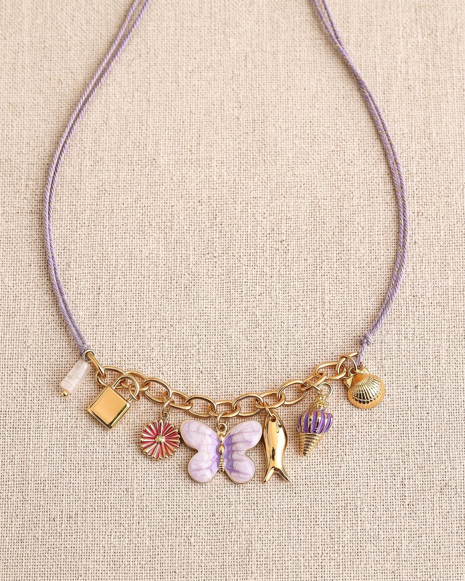Lunella Charm Necklace displayed on a clean background showing full necklace design